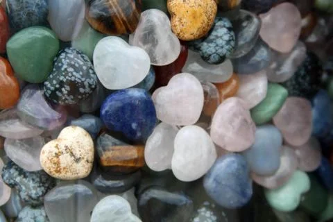 Multi-colored stone heart background Stock Photos