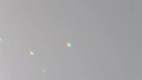 Multi-colored sun rays move randomly against, vertical video. Stock Footage 172477668