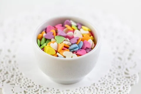 Multi-colored sweets in the form of a heart. Stock Photos