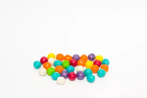 Multi-colored sweets on a white background. Stock Photos