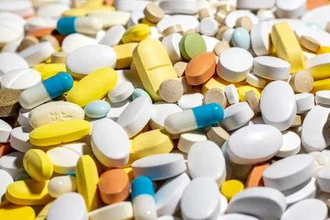 Multi colored tablets and medication, close up Stock Photos