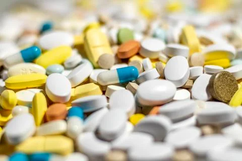 Multi colored tablets and medication, close up Stock Photos