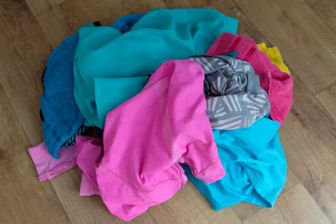 Multi-colored things on the floor are in a heap Stock Photos