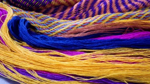 Multi colored thread and knitted pattern texture Stock Footage 137916421