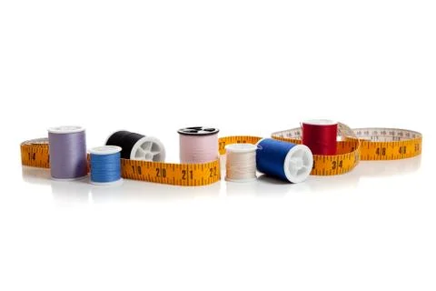 Multi colored thread with tape measure Stock Photos