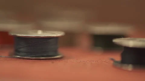 Multi-colored threads in spools for a sewing machine Stock Footage 266137078