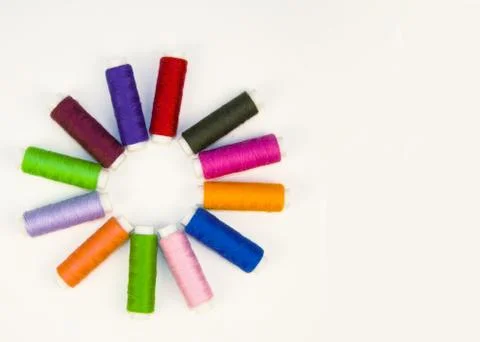 Multi-colored threads in spools, sewing kit Stock Photos