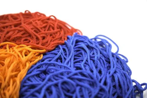 Multi-colored threads on a white background close-up Stock Photos