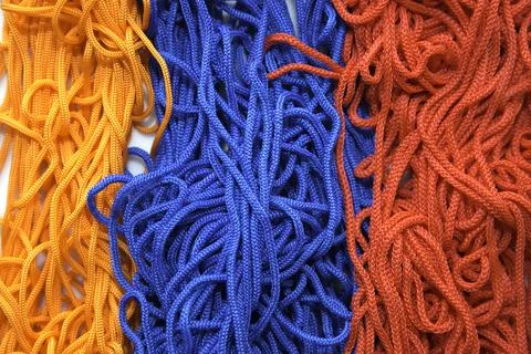 Multi-colored threads on a white background close-up Stock Photos
