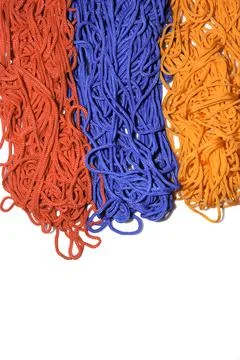 Multi-colored threads on a white background close-up 写真素材