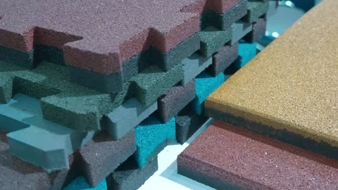 Multi-colored tiles made from rubber crumb from recycled tires Stock-Footage 330896168