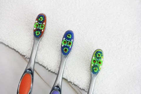 Multi-colored toothbrushes for cleaning teeth Stock Photos