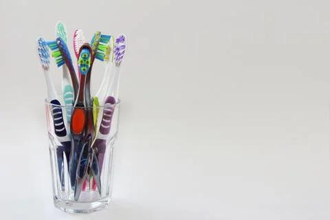 Multi-colored toothbrushes for cleaning teeth Stock Photos