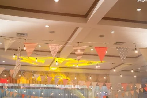 Multi Colored Triangle Flags Hanging Indoor Party Stock Photos