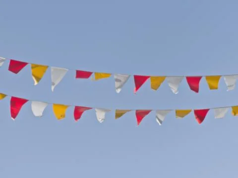 Multi-colored triangular flags 写真素材