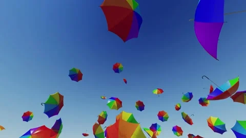 Multi-colored umbrellas are flying into the sky. Video stock 150158023