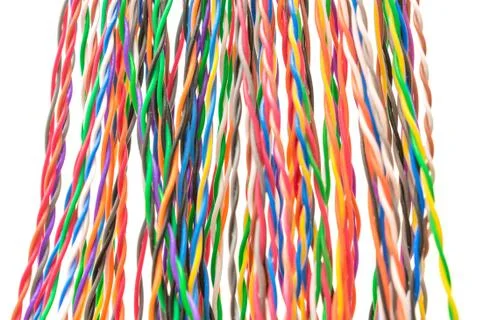 Multi-colored vertical electrical wires are on a white background. Telecommun 库存照片