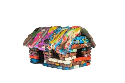 Multi-colored voluminous plasticine house from small piece block elements Stock Photos