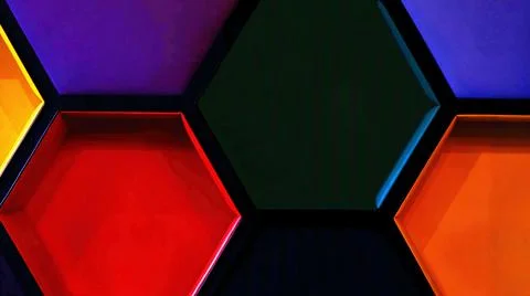 Multi-colored wall in the form of honeycombs Stock Photos