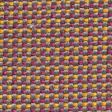 Multi colored woven fabric texture background with interlaced thread pattern Foto stock