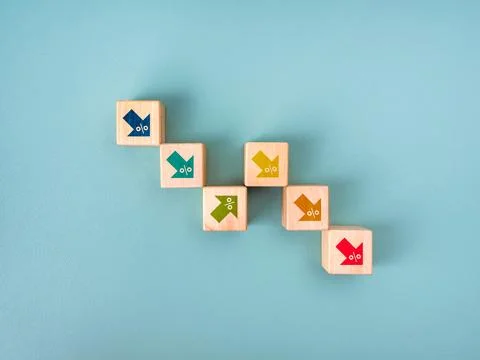 Multi colors up and down arrows with percentage icon on wooden cube blocks .. Stock Illustration