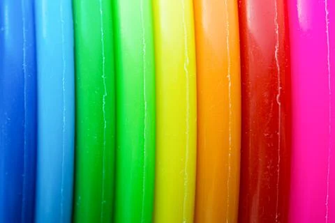 Multi colour plastic object. Colourful close up vertical pattern of children toy Stock Photos