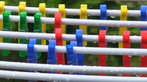 Multi-coloured clothespins under a rain 動画素材 262741