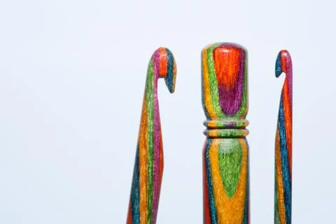 Multi-coloured crochet hooks Stock Photos