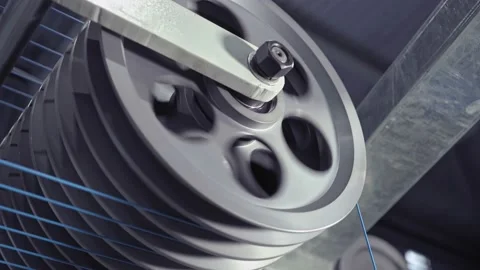 A multi-core cable in a metal sheath moves along a conveyor line. Stock Footage 137698669