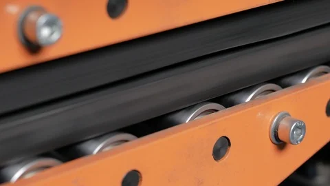 The multi-core cable in the shell moves along the conveyor line. Stock Footage 125414328