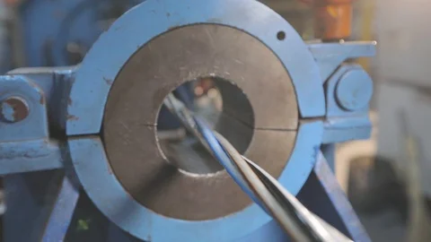 Multi-core cable weaving process, cable production in a modern factory. Multi Stock Footage 129765365