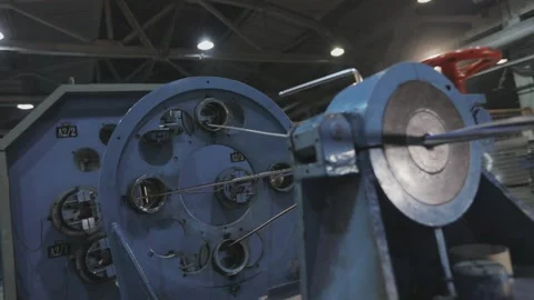 Multi-core cable weaving process, cable production in a modern factory. Multi Stock Footage 132249392