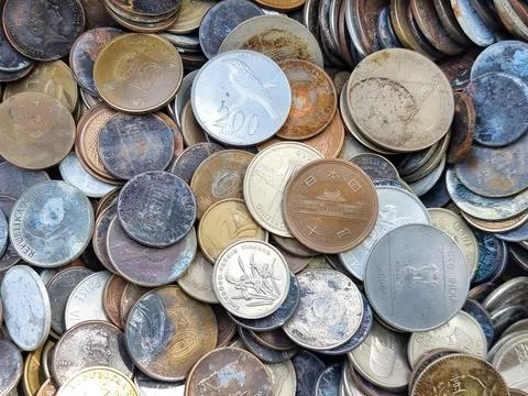 Multi-currency coins. Background image. Stock Photos