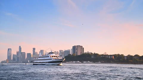 Multi-deck riverboat approaches by the riverscape. Some people ride the water Stock Footage 316557530