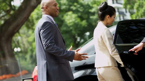 Multi Ethnic Business Executives Using Limousine Stock Footage 26367905
