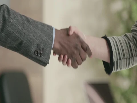 Multi ethnic business hand shake close up Stock Footage 74154995