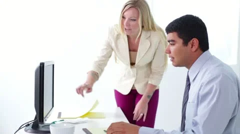 Multi-Ethnic Business Team Discuss Item on Computer Screen Stock Footage 22115047