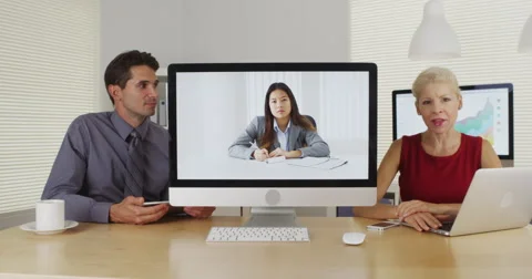 Multi-ethnic businessteam having a conversation with camera Video stock 42696546