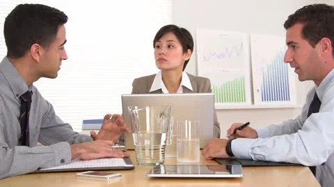 Multi-ethnic businessteam working hard in the office Video stock 25541528