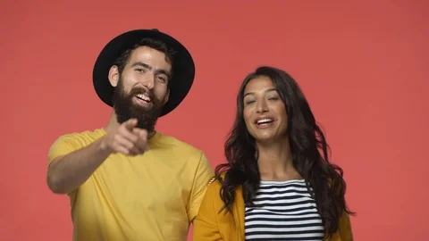Multi-ethnic couple discussing something very funny, amusing, sharing opinions Stock Footage 115783074