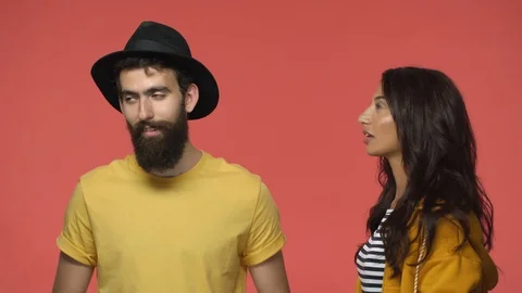 Multi-ethnic couple having argument. Bearded boyfriend sighing, tired of Stock Footage 115782916