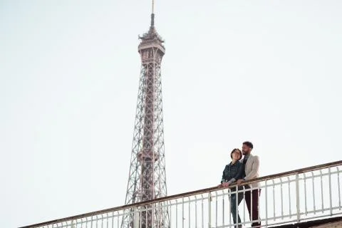 Multi-ethnic Couple Having Fun In Paris Near Eiffel Tower 写真素材