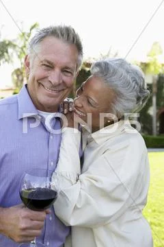 Multi Ethnic Couple Standing Together Stock Photos