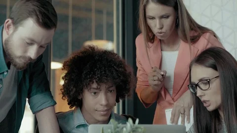 Multi-Ethnic Creative Business Team Discussing New Project Using Digital Display Stock Footage 93237348