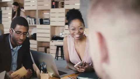 Multi ethnic creative team discussing new project. International business Stock Footage 87947772