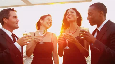 Multi ethnic friends drinking toasting at luxury outdoor cocktail party   Stock Footage 11982190