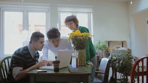 Multi-ethnic Friends Having Fun Sharing Laptop Computer Stock Footage 107111186