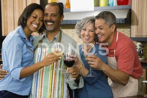Multi-Ethnic Friends Toasting With Wine