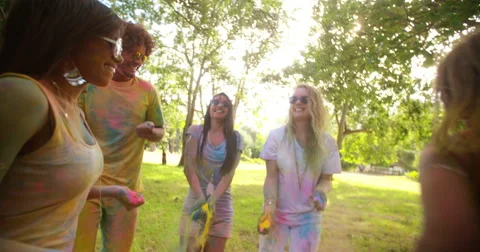 Multi-Ethnic Group Celebrating Holi Festival in Park Stock Footage 61466824
