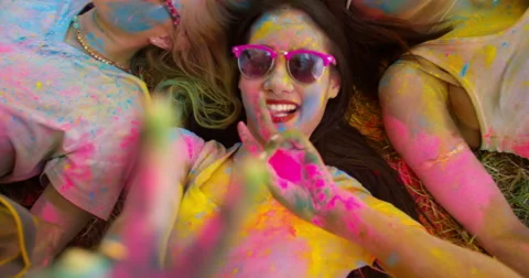 Multi-Ethnic Group Celebrating Holi Festival in Park Vídeos de archivo 61468768